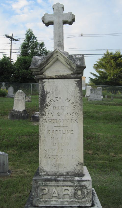 Grave stone that reads: "Trifley Paro died Jan. 24, 1890, aged 60 yrs.; Caroline, his wife, died Sept. 1, 1908, aged 75 yrs"